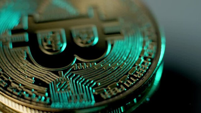 Crypto currency, bitcoin. BTC, Bit Coin. Blockchain technology, bitcoin mining. Macro shot of rotating bitcoins