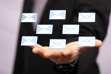  email icon concept in hand background