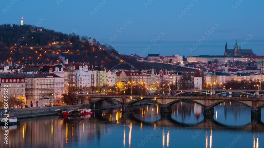 Wall mural prague, czech republic. jiraskuv bridge over vltava river in prague, czech republic. timelapse durin