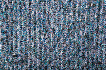 Knitted blue sparkly cloth texture