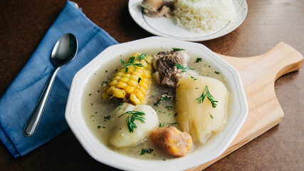 traditional food colombia sancocho soup, meat, corn, potato.