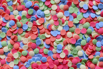 Fototapeta na wymiar Colorful candy background with sweet confettis