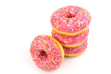 Fresh made Donuts isolated on white background. Doughnuts are traditional sweet pastries. Copy space for text.