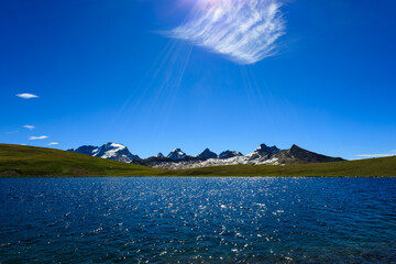 Lago Rosset. Sullo sfondo il gruppo del Gran Paradiso