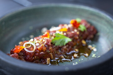 Beef steak tartar plate with chinese onion and ponzu japanese sauce