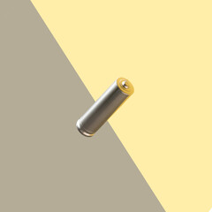 Levitation alkaline rechargeable battery on grey and yellow backdrop. Minimal electronic concept.