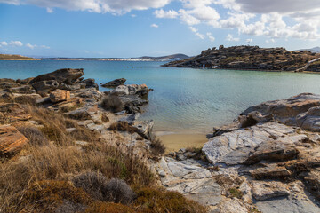 Fototapeta na wymiar View of the rocky coast at Monasteri Beach. Paros Island, Greece.