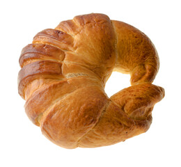 Confectionery product ruddy bun in the shape of a donut, view from the top, on a white background in isolation