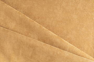 curtain fabric light brown canvas folded diagonally