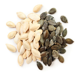 Pumpkin seeds or pepitas peeled and not peeled on a white background, isolated. The view from top