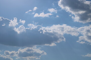 Clouds on a blue background with white clouds.