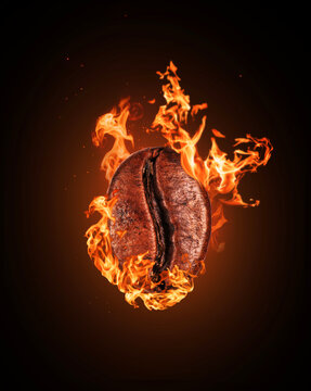 Coffee bean in a burning flame on a black background