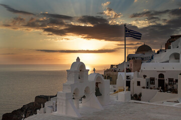 Sunset over the landscape of Santorini island in Greece.