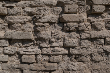 Abstract brick background. Old white brick wall. Architectural elements. Horizontal photo. Close-up. 