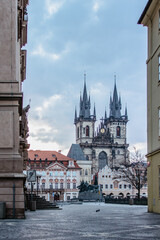 Fototapeta premium Morning postcard view of empty Old Town Square with Church of Our Lady, Tyn Church,Prague, Czech Republic. Beautiful city centre without people.Famous unesco heritage place.Picturesque urban scene