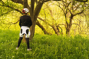 boy cyclist talking piss