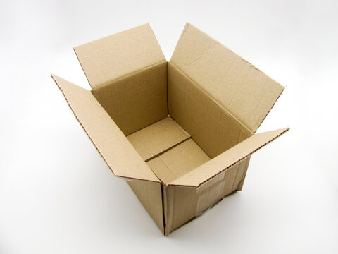 open brown corrugated cardboard box on white background
