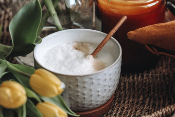 A cup of cappuccino decorated with flowers