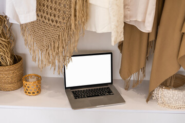 Blank screen laptop. Home office workspace. Modern nordic interior design template.