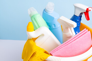 Cleaning supplies isolated on blue background. Cleaning accessories. Isolate. Top view. Close up.