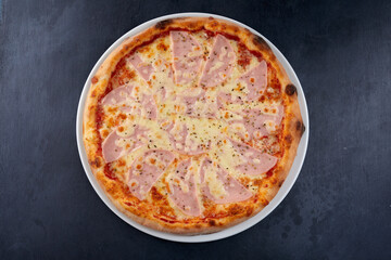 fresh pizza on the white plate