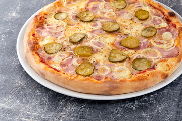 fresh pizza on the white plate