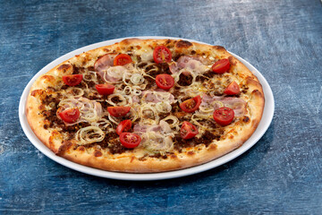 fresh pizza on the white plate