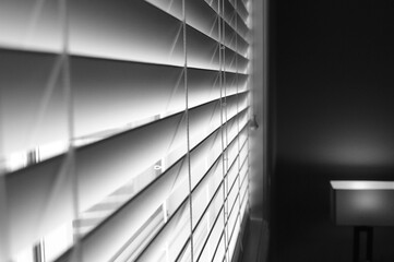 light peering through the blinds