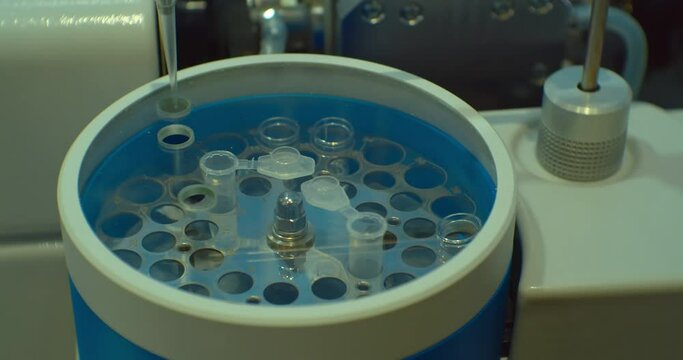science and technology. laboratory equipment. demonstration of the work of a modern automatic substance analyzer. Close-up.