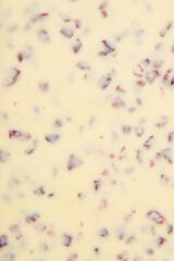 White chocolate with berry texture background