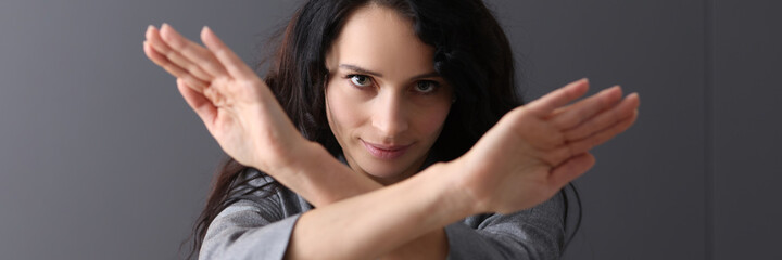 Business woman folding her arms in front of her