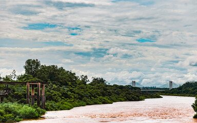 panoramic view of Cuiab&aacute;, Mato Grosso by the turbulent Cuiab&aacute; River with the S&eacute;rgio Motta bridge in the background