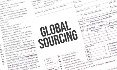 Yellow Paper Note With Words global sourcing , Tax concept