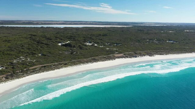 2020 - Excellent aerial shot of clear blue waves lapping the shores near Great Ocean Drive in Esperance, Australia.