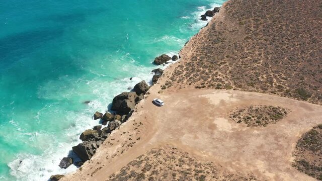 2020 - Excellent aerial shot of a car parked on the edge of the Great Australian Bight in south Australia.