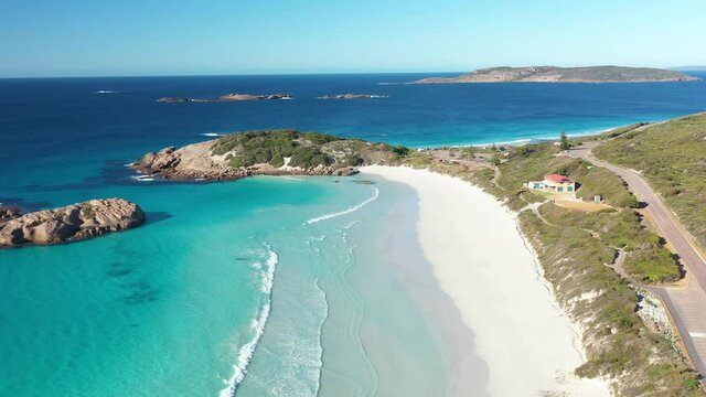 2020 - Excellent aerial shot of clear blue water lapping the white sands of Twilight Beach in Esperance, Australia.