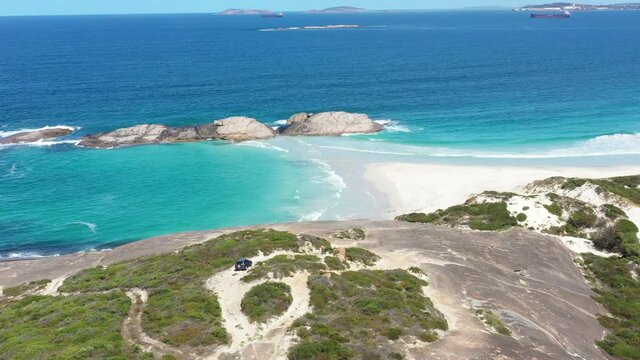 2020 - Excellent aerial shot of a van parked at Wylie Bay, overlooking the beach in Esperance, Australia.