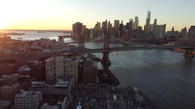 2020 - Very good aerial over lower Manhattan New York, Brooklyn Bridge, Manhattan Bridge and East River.