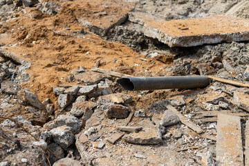 Consequences of a gas explosion - the ruins of the city-metal and wood and debris