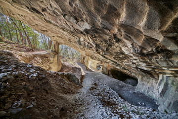 Beautiful Limestone cave, Old Oolitic stone quarries in Massone, The extracted stone, called 