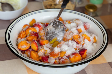 Apricot halves in sugar. Preparations for the winter. Fruit jam