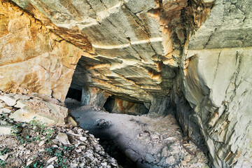 Beautiful Limestone cave, Old Oolitic stone quarries in Massone, The extracted stone, called "statuary stone"Arco, Italy. Bosco Caproni