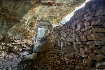 Beautiful Limestone cave, Old Oolitic stone quarries in Massone, The extracted stone, called 