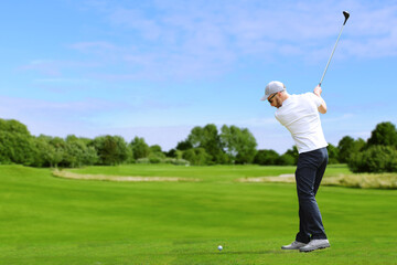 Golfer hit a golf ball