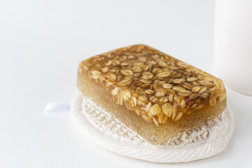 Handmade scrub soap with oatmeal. Eco friendly stuff concept. Horizontal orientation. Copy space.