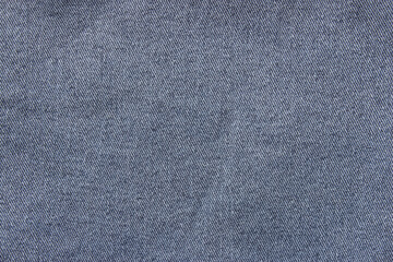 Close-up blue denim texture. Blue jeans texture for background. Texture of blue jeans as background, close up