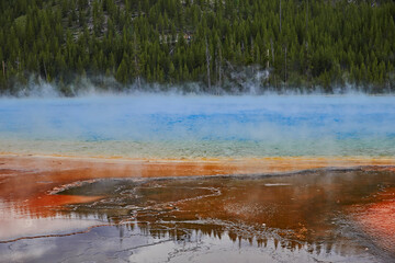 Prismatic pool with colored earth and hot water