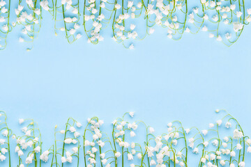 Lily of the valleys flowers on a light blue background. Mothers Day, Valentines Day, bachelorette