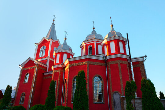 Orthodox church painted in red . Monastery of village Zloti from Moldova