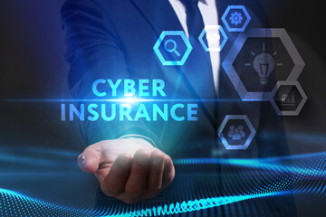 Business, Technology, Internet and network concept. Young businessman working on a virtual screen of the future and sees the inscription: Cyber insurance